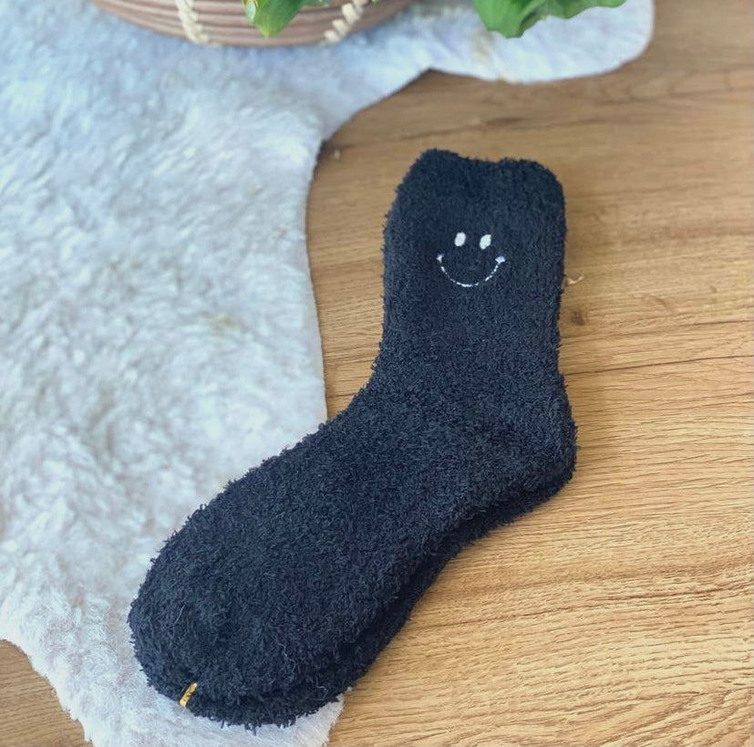 Black smiley fuzzy socks