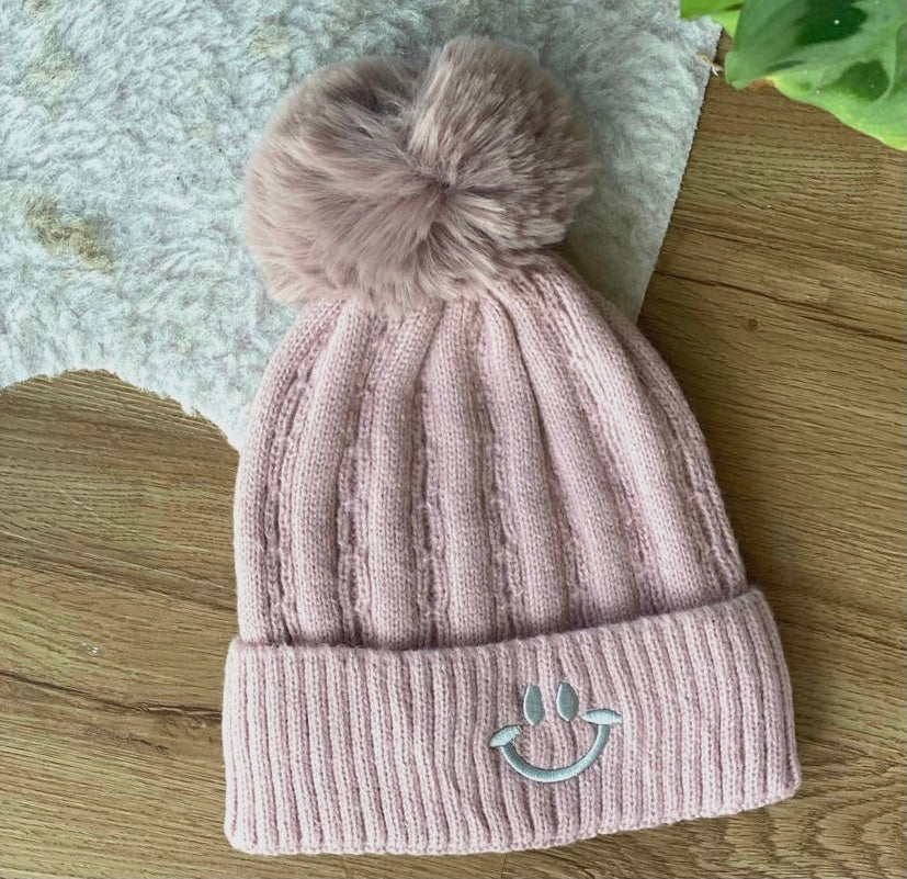 Pink smiley pom beanie